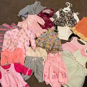 assorted baby clothes